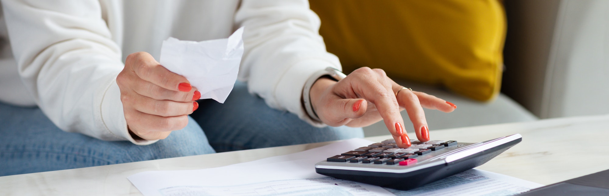 Business woman calculating balance prepare tax reduction income, cost budget expenses for pay money