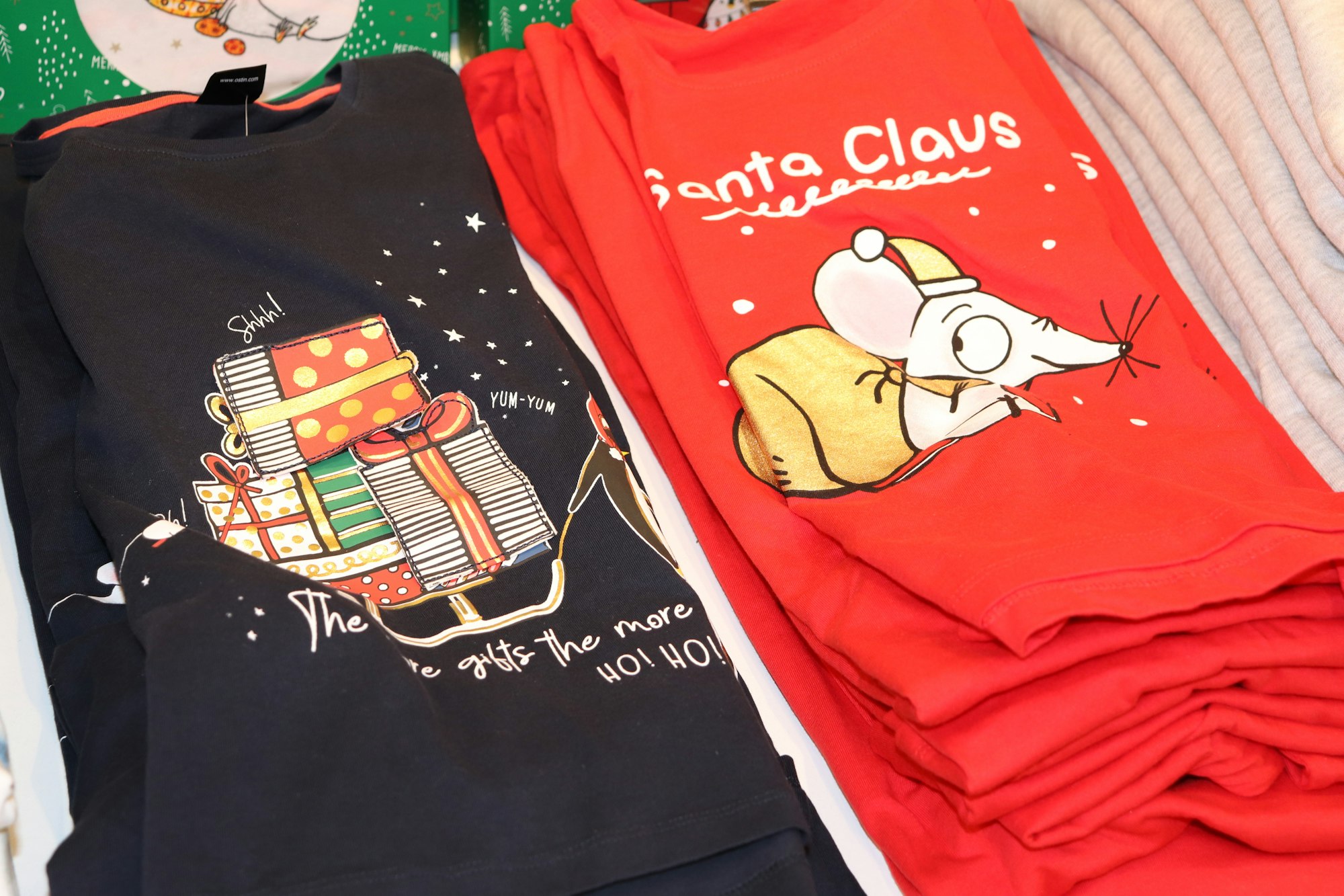 t-shirts with Christmas print. drawn with mouse and gifts