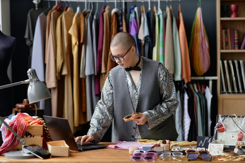 Thrift Store Sales Clerk Selling Clothes and Fashion Accessories