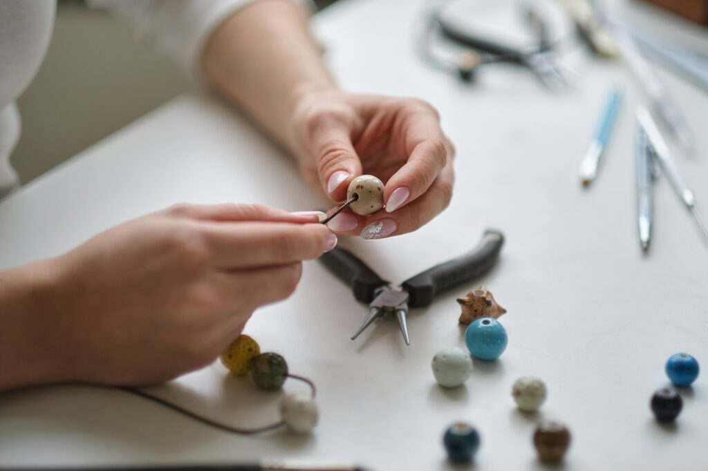 Craft jewelery making with professional tools.