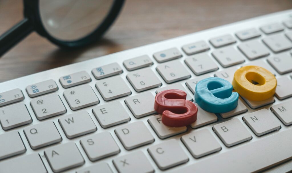 Search engine optimization concept. Alphabet of seo on a computer keyboard.