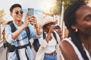 Happy photographer people on travel summer vacation or holiday for international tourism and lens f